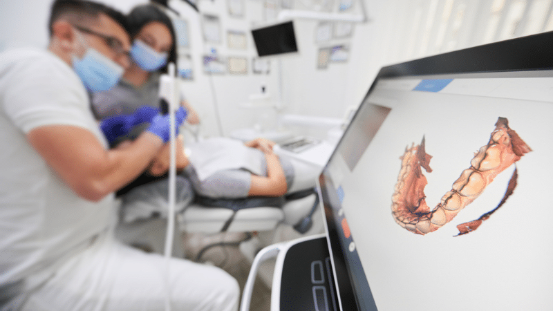 Dental diagnostic tools and CBCT imaging equipment are used in dental implant cost assessment.