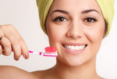 Brush twice daily after dental crowns